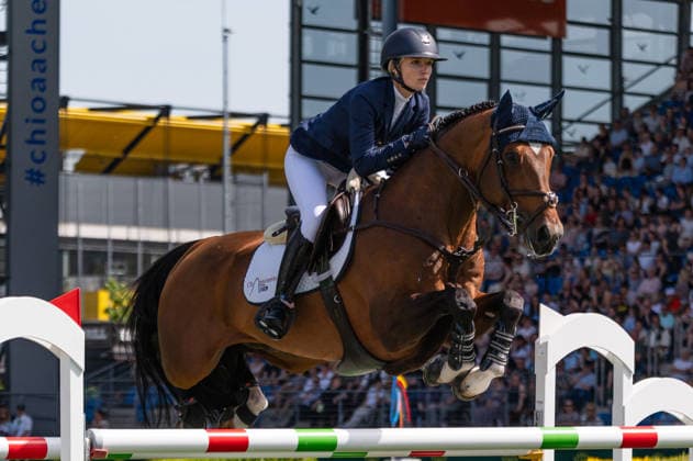 179 Lillie Keenan on Kick On (USA) during the TSCHIO 2026 (CHIO 2026) - 2nd Qualifier Rolex Grand Prix - CSI5* - Jumping competition with jump-off at the Allianz Park in Aachen, Germany Copyright: xMartinxPitschx xSPPx Sportspressphoto_152455