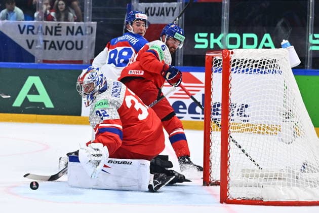 L-R Goalkeeper Josef Korenar, Michal Kempny (CZE) and Martin Chromiak (SVK) in action during the group B match of the World Ice hockey, Eishockey Championship, Slovakia - Czech Republic, Fribourg, Switzerland, on May 23, 2026. (CTKxPhoto RadekxPetrasek) CTKPhotoP2026052305157  CTKPhotoP2026052305157