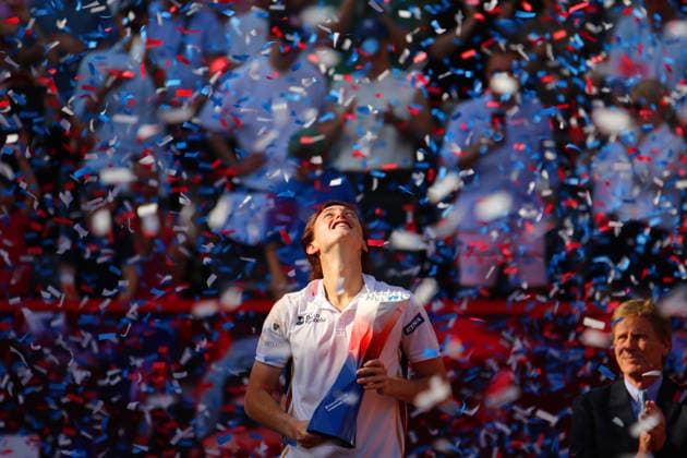 Bitpanda Hamburg Open, ATP 500 Ignacio Buse from Peru enjoys the shower of confetti after the award ceremony