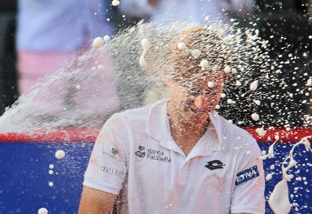 Bitpanda Hamburg Open, ATP champagne shower by Tommy Paul USA for tournament winner Ignacio Buse from Peru