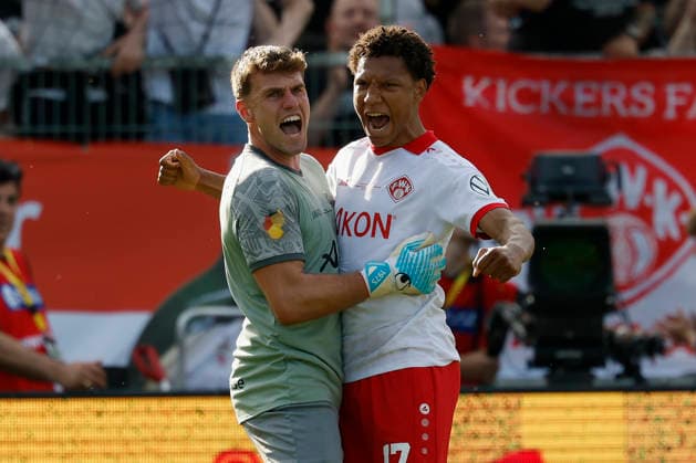 from left to right Goalkeeper Johann Hipper Würzburger Kickers and Liam Omore Würzburger Kickers cheer after the victory against 1860 in the final of the Bavarian Toto Cup between FC Würzburger Kickers and TSV 1860 Munich at Stadion am Dallenberg, Würzburg, Germany, May 23, 2026 Copyright: HMBxMedia xHeikoxBecker