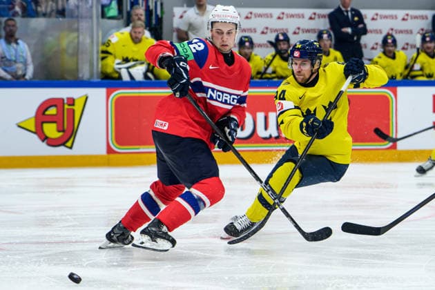 260523 Stian Solberg of Norway and Joel Persson of Sweden during the 2026 IIHF Ice Hockey World Championship match between Norway and Sweden on May 23, 2026 in Fribourg Photo Jesper Zerman BILDBYRAN kod JZ JZ0727 ishockey ice hockey ishockey vm 2026 vm 2026 iihf world championship norge norway sverige sweden bbeng  Copyright: JESPERxZERMAN BB260523JZ026