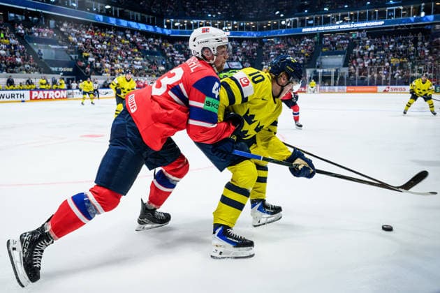 260523 Max Krogdahl of Norway and Simon Holmström of Sweden during the 2026 IIHF Ice Hockey World Championship match between Norway and Sweden on May 23, 2026 in Fribourg Photo Jesper Zerman BILDBYRAN kod JZ JZ0727 ishockey ice hockey ishockey vm 2026 vm 2026 iihf world championship norge norway sverige sweden bbeng  Copyright: JESPERxZERMAN BB260523JZ035