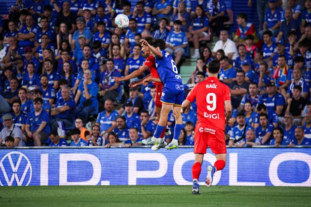 Getafe vs Osasuna, on the 38th matchday of the 2025 26 Spanish First Division May 23, 2026, Getafe, Madrid, Spain Torro and Mario Martin fight for the ball during the Spanish championship LaLiga football match between Getafe and Osasuna on 23 May 2026 at Estadio El Coliseum in Getafe, Madrid, Spain Madrid Madrid Madrid Spain Copyright: xAlejandroxMatiasx