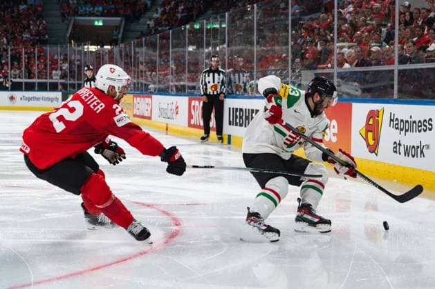 ZURICH, ZURICH - MAY 23: Nino Niederreiter of Switzerland battles with Zeteny Hadobas of Hungary during the 2026 IIHF World Championship, WM, Weltmeisterschaft Preliminary Round Group A match between Switzerland and Hungary at Swiss Life Arena on May 23, 2026 in Zurich, Zurich, Switzerland. Copyright: xLivioxBaeriswylx xSPPx Sportspressphoto_152913