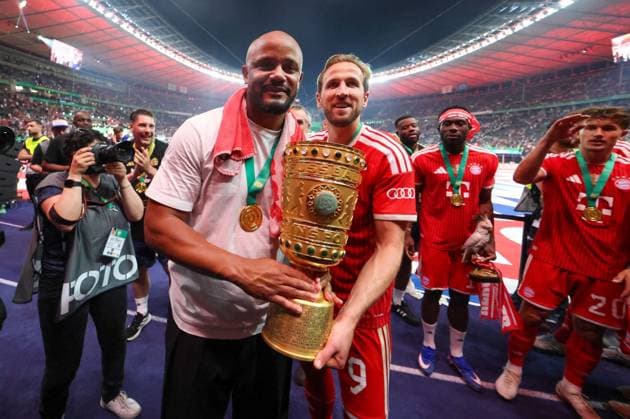 Head Coach Vincent Kompany FC Bayern Muenchen , Harry Kane 9 FC Bayern Muenchen , holds the DFB Cup in his hands, FC Bayern Muenchen vs VfB Stuttgart, Football, 83 DFB Cup Final, 23 05 2026 DFL DFB regulations prohibit any use of photographs as image sequences and or quasi video Berlin Berlin Germany Copyright: xkolbert-press ChristianxKolbertx