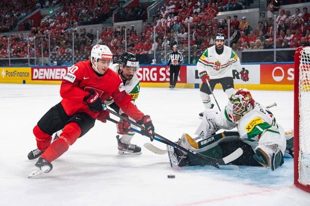 ZURICH, ZURICH - MAY 23: Nicolas Bächler of Switzerland battles in front of the Hungary goal during the 2026 IIHF World Championship, WM, Weltmeisterschaft Preliminary Round Group A match between Switzerland and Hungary at Swiss Life Arena on May 23, 2026 in Zurich, Zurich, Switzerland. Copyright: xLivioxBaeriswylx xSPPx Sportspressphoto_152960