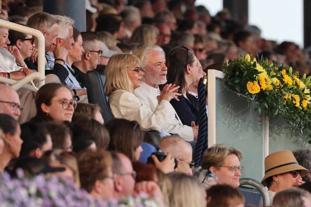 Britt Ekland the legendary Bond Girl from the film The Man with the Golden Gun and Hermann Bühlbecker Managing Director and sole shareholder of Aachener Printen und Schokoladenfabrik Henry Lambertz GmbH Co KG on the VIP stand, Richard Vogel and Luciana Diniz, Concert Horse Symphony, supporting program, motto of the evening James Bond, World Equestrian Festival, TSCHIO Aachen 2026, TSCHIO instead of CHIO 2026, Aachener Soers, 22 to 24 May 2026, equestrian sport, 23 05 2026, Aachener Soers Aachen Germany