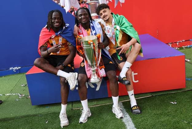 Hull City players celebrate with the trophy Hull City v Middlesbrough, EFL Sky Bet Championship, Play-Off Final, Football, Wembley Stadium, London, UK - 23 May 2026London Wembley Stadium United Kingdom EDITORIAL USE ONLY No use with unauthorised audio, video, data, fixture lists, club league logos or live services. Online in-match use limited to 120 images, no video emulation. No use in betting, games or single club league player publications. Copyright: xKieranxMcManus Shutterstockx 16887313id