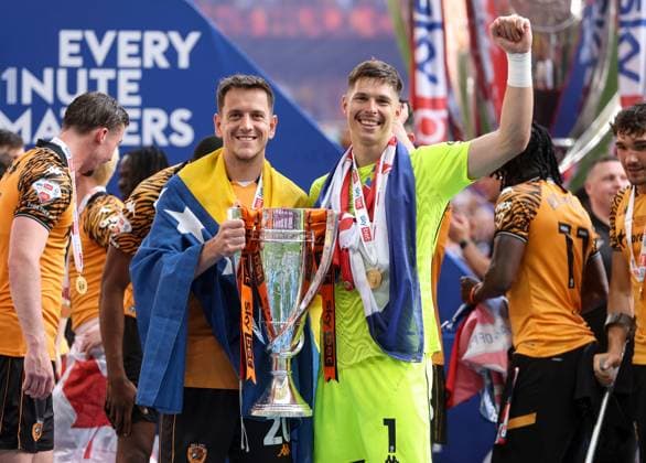 Amir Hadziahmetovic and Ivor Pandur of Hull City celebrate with the trophy Hull City v Middlesbrough, EFL Sky Bet Championship, Play-Off Final, Football, Wembley Stadium, London, UK - 23 May 2026London Wembley Stadium United Kingdom EDITORIAL USE ONLY No use with unauthorised audio, video, data, fixture lists, club league logos or live services. Online in-match use limited to 120 images, no video emulation. No use in betting, games or single club league player publications. Copyright: xKieranxMcManus Shutterstockx 16887313lq
