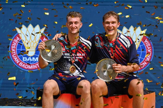 (260524) -- KUALA LUMPUR, May 24, 2026 -- Gold medalists Daniel Lundgaard Mads Vestergaard (R) of Denmark celebrate during the awarding ceremony after the men s doubles final between Daniel Lundgaard Mads Vestergaard of Denmark and Goh Sze Fei Nur Izzuddin Rumsani of Malaysia at 2026 Malaysia Masters badminton tournament in Kuala Lumpur, Malaysia, May 24, 2026. (Photo by Xinhua) (SP)MALAYSIA-KUALA LUMPUR-BADMINTON-MALAYSIA MASTERS-MEN S DOUBLES ChongxVoonxChung 