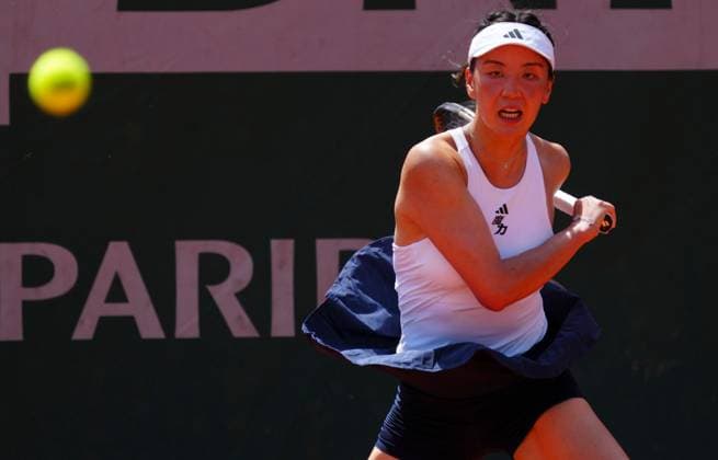 Xinyu Wang in first round action French Open Tennis, Day One, Tennis, Roland Garros, Paris, France - 24 May 2026Paris Roland Garros France EDITORIAL USE ONLY No use with unauthorised audio, video, data, fixture lists, club league logos or live services. Online in-match use limited to 120 images, no video emulation. No use in betting, games or single club league player publications. Copyright: xJavierxGarcia Shutterstockx 16889883v