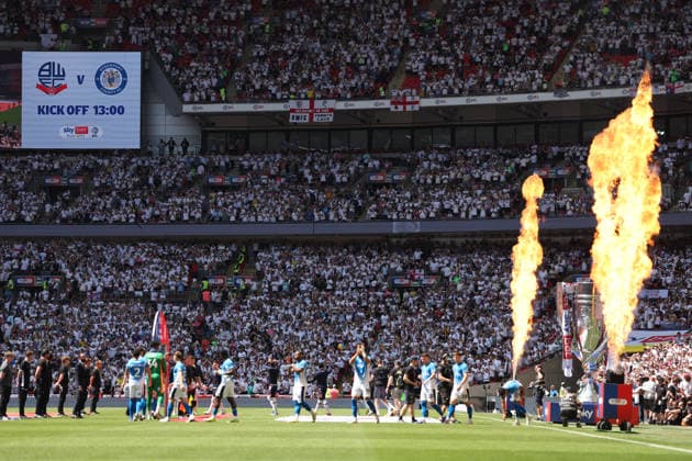 LONDON, ENGLAND - MAY 24: Teams walk out before the Sky Bet League One Play-Off Final match between Bolton Wanderers and Stockport County at Wembley Stadium on May 24, 2026 in London, England.  Copyright: xMBxMediax