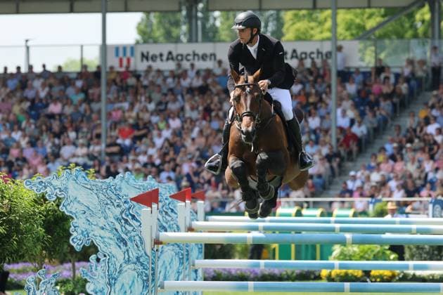 Richard Vogel GER with horse United Touch S, clear round in 1st round , Rolex Grand Slam of Show Jumping, jumping competition with two rounds and jump-off , World Equestrian Festival, TSCHIO Aachen 2026, TSCHIO instead of CHIO 2026, Aachener Soers, 22 to 24 May 2026, equestrian sport, 24 05 2026, Aachener Soers Germany