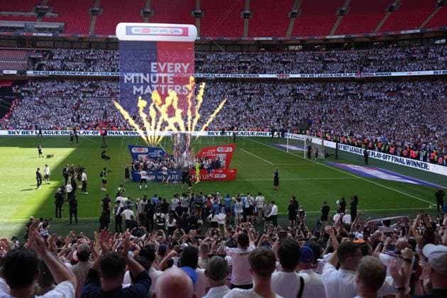League One Play off final Winning club celebrations on winners boards, Bolton Wanderers players Bolton Wanderers v Stockport County, EFL Sky Bet League One, Play-Off Final, Football, Wembley Stadium, London, UK - 24 May 2026London Wembley Stadium United Kingdom EDITORIAL USE ONLY No use with unauthorised audio, video, data, fixture lists, club league logos or live services. Online in-match use limited to 120 images, no video emulation. No use in betting, games or single club league player publications.  Copyright: xJoexToth Shutterstockx 16889806gm