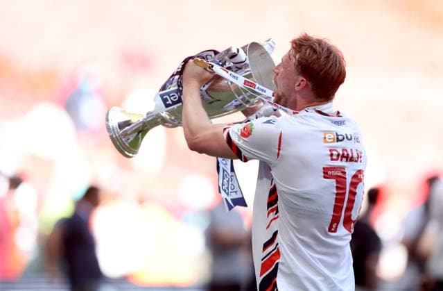 Sam Dalby of Bolton Wanderers celebrates with the trophy after winning the EFL Championship Play-off Final and promotion to the Premier League Bolton Wanderers v Stockport County, EFL Sky Bet League One, Play-Off Final, Football, Wembley Stadium, London, UK - 24 May 2026London Wembley Stadium United Kingdom EDITORIAL USE ONLY No use with unauthorised audio, video, data, fixture lists, club league logos or live services. Online in-match use limited to 120 images, no video emulation. No use in betting, games or single club league player publications.  Copyright: xKieranxMcManus Shutterstockx 16889802em