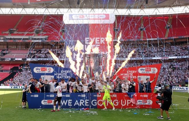 League One Play off final Winning club celebrations on winners boards, Bolton Wanderers players Bolton Wanderers v Stockport County, EFL Sky Bet League One, Play-Off Final, Football, Wembley Stadium, London, UK - 24 May 2026London Wembley Stadium United Kingdom EDITORIAL USE ONLY No use with unauthorised audio, video, data, fixture lists, club league logos or live services. Online in-match use limited to 120 images, no video emulation. No use in betting, games or single club league player publications.  Copyright: xAndrewxFosker Shutterstockx 16889807bu