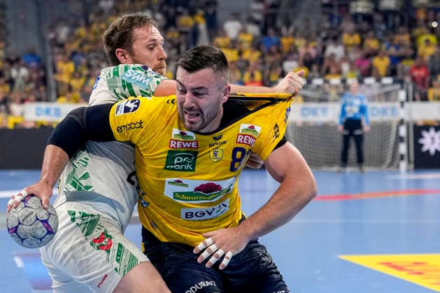 from left Albin Lagergren SCM, 21 , Jannik Kohlbacher RNL, 80 , duel, duel, tackle, tackling, dynamics, action, action, 24 05 2026, Mannheim Germany , Handball, Bundesliga, Rhein Neckar Löwen SC Magdeburg xozx
