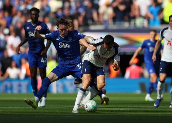 24th May 2026; Tottenham Hotspur Stadium, London, England; Premier League Football, Tottenham Hotspur versus Everton; Joao Palhinha of Tottenham Hotspur under pressure from James Garner of Everton JPxFletcher