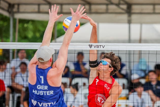 (260524) -- LAGUNA PROVINCE, May 24, 2026 -- Philipp Huster (L) of Germany competes against Julian Friedli of Switzerland during the men s bronze medal match between Philipp Huster Sven Winter of Germany and Julian Friedli Jonathan Jordan of Switzerland at the Volleyball World Beach Pro Tour Challenge in Laguna Province, the Philippines, May 24, 2026. ) (SP)PHILIPPINES-LAGUNA PROVINCE-VOLLEYBALL WORLD BEACH PRO TOUR CHALLENGE ROUELLExUMALI 