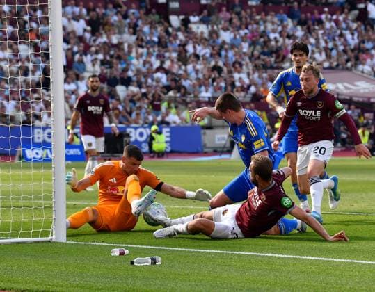 Karl Darlow of Leeds United saves under pressure from Tomas Soucek of West Ham United West Ham United v Leeds United, Premier League, Football, London Stadium, London, UK - 24 May 2026London London Stadium United Kingdom EDITORIAL USE ONLY No use with unauthorised audio, video, data, fixture lists, club league logos or live services. Online in-match use limited to 120 images, no video emulation. No use in betting, games or single club league player publications.  Copyright: xAlanxWalter Shutterstockx 16889881v