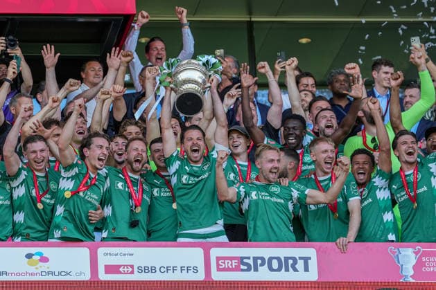 Football, Swiss Cup, Final FC St Gallen 1879 vs FC Stade Lausanne Ouchy, Sunday, 24 05 2026 Stadion Wankdorf, Bern FC St Gallen players cheer with the trophy on the main stand in the Wankdorf Copyright: xValentinxDomgjonix