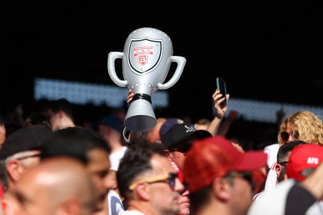London, England, 24th May 2026. Arsenal fans celebrate with an inflatable trophy during the Crystal Palace vs Arsenal Premier League match at Selhurst Park, London. Picture credit should read: Paul Terry Sportimage EDITORIAL USE ONLY. No use with unauthorised audio, video, data, fixture lists, club league logos or live services. Online in-match use limited to 120 images, no video emulation. No use in betting, games or single club league player publications. SPI_055_PT_Palace_Arsenal SPI-4818-0050