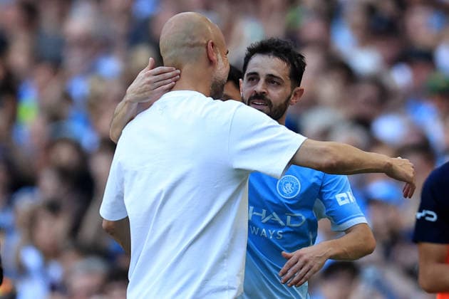24th May 2026; Etihad Stadium, Manchester, Lancashire, England; Premier League Football, Manchester City versus Aston Villa; Bernardo Silva of Manchester City is hugged bt Manchester City manager Pep Guardiola as he is substituted DavidxBlunsden