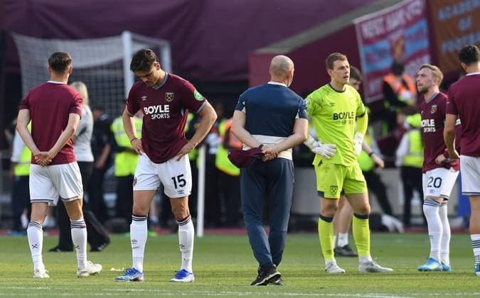 Konstantinos Mavropanos ,Mads Hermansen and Jarrod Bowen of West Ham United look dejected at the end of the match West Ham United v Leeds United, Premier League, Football, London Stadium, London, UK - 24 May 2026London London Stadium United Kingdom EDITORIAL USE ONLY No use with unauthorised audio, video, data, fixture lists, club league logos or live services. Online in-match use limited to 120 images, no video emulation. No use in betting, games or single club league player publications.  Copyright: xAlanxWalter Shutterstockx 16889881ap