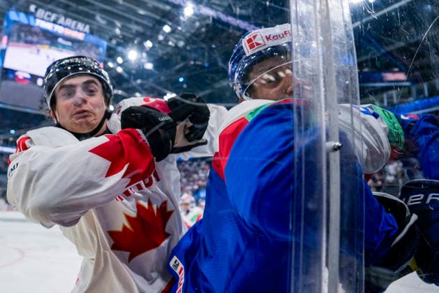 FRIBOURG, SWITZERLAND MAY 24 Porter Martone of Canada L against Viliam Kmec of Slovakia R during the 2026 IIHF Ice Hockey World Championship Switzerland game between Slovakia and Canada at BCF Arena on May 24, 2026 in Fribourg, Fribourg Fribourg BCF Arena Fribourg Switzerland Copyright: xJustPictures.ch JarixPestelaccix jp-en-EuSpIm-JP6_JAR_Slovakia_Canada_24May2026_00016