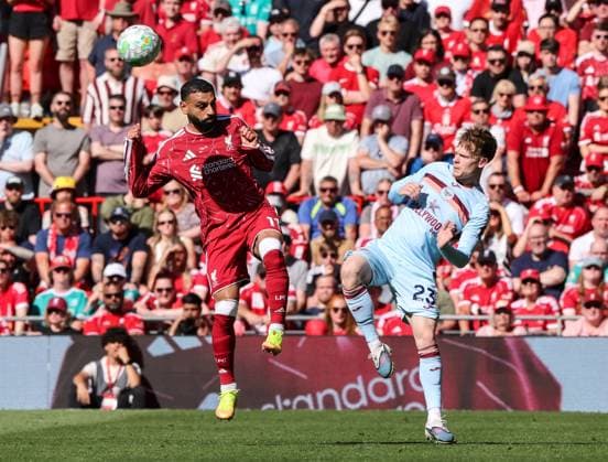 Brentford s Keane Lewis-Potter battles with Liverpool s Mohamed Salah Liverpool v Brentford, Premier League, Football, Anfield, Liverpool, UK - 24 May 2026Liverpool Anfield United Kingdom EDITORIAL USE ONLY No use with unauthorised audio, video, data, fixture lists, club league logos or live services. Online in-match use limited to 120 images, no video emulation. No use in betting, games or single club league player publications.  Copyright: xAlexxDodd Shutterstockx 16889846cn