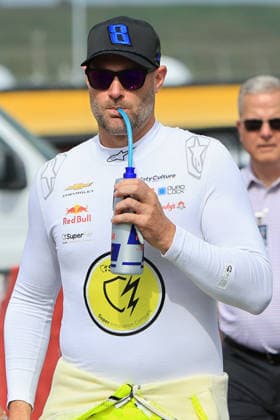 CHARLOTTE, NC - MAY 24: Shane Van Gisbergen ( 97 TrackHouse Racing SuperFile Chevrolet) walks in the garage area wearing a Hat honoring the late Kyle Busch prior to the running of the NASCAR, Motorsport, USA Cup Series Coca-Cola 600 on May 24, 2026 at Charlotte Motor Speedway in Charlotte, NC. (Photo by Jeff Robinson Icon Sportswire) AUTO: MAY 24 NASCAR Cup Series Coca-Cola 600 EDITORIAL USE ONLY Icon2605246107600