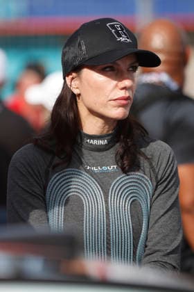 CHARLOTTE, NC - MAY 24: Katherine Legge ( 78 Live Fast Motorsports e.l.f. Cosmetics Chevrolet) talks with a member of her race team while wearing a hat honoring the late Kyle Busch prior to the running of the NASCAR, Motorsport, USA Cup Series Coca-Cola 600 on May 24, 2026 at Charlotte Motor Speedway in Charlotte, NC. (Photo by Jeff Robinson Icon Sportswire) AUTO: MAY 24 NASCAR Cup Series Coca-Cola 600 EDITORIAL USE ONLY Icon2605247872600