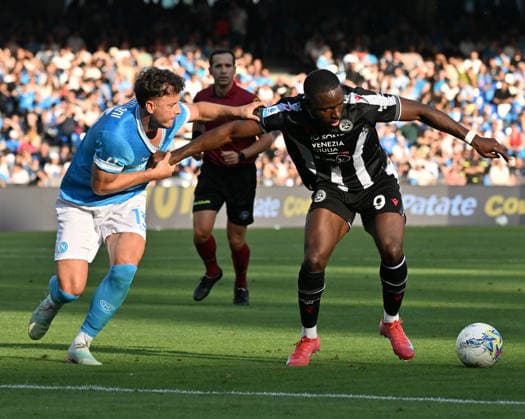 (260525) -- NAPLES, May 25, 2026 -- Napoli s Amir Rrahmani (L) vies with Udinese s Keinan Davis during a Serie A soccer match between Napoli and Udinese in Naples, Italy, May 24, 2026. (Photo by Xinhua) (SP)ITALY-NAPLES-SOCCER-SERIE A-NAPOLI VS UDINESE DiegoxPetrussi 