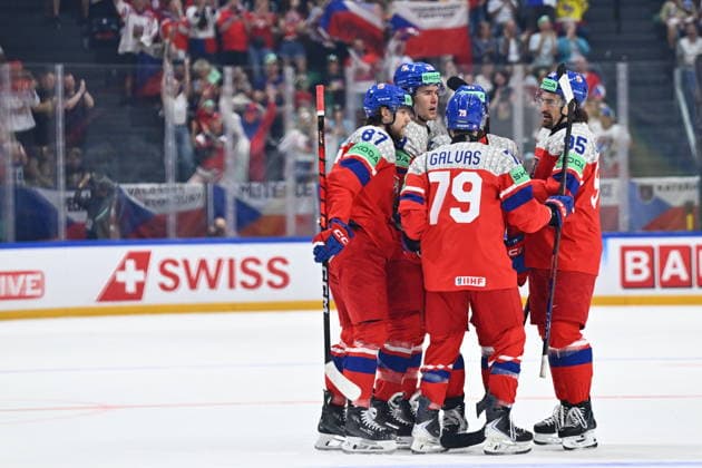 From left Michal Kovarcik, Tomas Galvas and Daniel Vozenilek of Czech Republic celebrate a goal during the IIHF World Championship, WM, Weltmeisterschaft Group B match Czech Republic vs Norway on May 25, 2026, Fribourg, Switzerland. (CTKxPhoto RadekxPetrasek) CTKPhotoP2026052505483  CTKPhotoP2026052505483