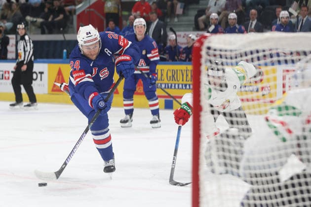 25 05 2026 Swiss Life Arena Zurich , SWITZERLAND, Mens Ice Hockey IIHF World Championship Zurich 2026 Group A USA HUN Mathieu Olivier left, USA in front of goaltender Adam Vay HUN