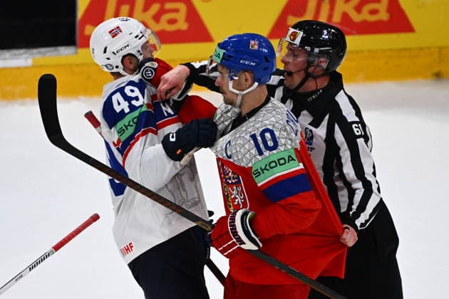 Christian Kaasastul of Norway, left, and Roman Cervenka of Czech Republic in action during the IIHF World Championship, WM, Weltmeisterschaft Group B match Czech Republic vs Norway on May 25, 2026, Fribourg, Switzerland. (CTKxPhoto RadekxPetrasek) CTKPhotoP2026052506201  CTKPhotoP2026052506201