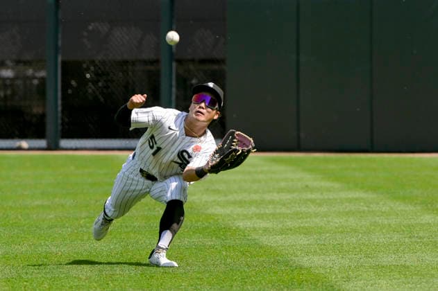 Chicago White Sox right fielder Rikuu Nishida (51) runs for the fly ball against the Minnesota Twins during the seventh inning at Rate Field in Chicago, IL on Monday, May 25, 2026. Sox defeated the Twins 3-1.  CHI20260525137 MARKxBLACK