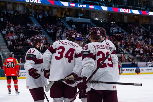ZURICH, SWITZERLAND - MAY 26: Eduards Tralmarks (Latvia,34) during his 3:0 goal celebration during the Preliminary Round - Group A Match 51 between Hungary and Latvia at the IIHF Ice hockey, Eishockey World Championship, WM, Weltmeisterschaft 2026, Swiss Life Arena on May 26, 2026 in Zurich, Switzerland. Zurich Switzerland Copyright: xTimoxSteinx