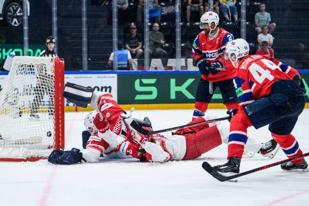 260526 Goaltender Nicolaj Henriksen and Malte Setkov of Denmark and Tinus Luc Koblar of Norway during the 2026 IIHF Ice Hockey World Championship match between Norway and Denmark on May 26, 2026 in Fribourg Photo Jesper Zerman BILDBYRAN kod JZ JZ0731 ishockey ice hockey ishockey vm 2026 vm 2026 iihf world championship norge norway danmark denmark bbeng norge norway danmark denmark  Copyright: JESPERxZERMAN BB260526JZ012