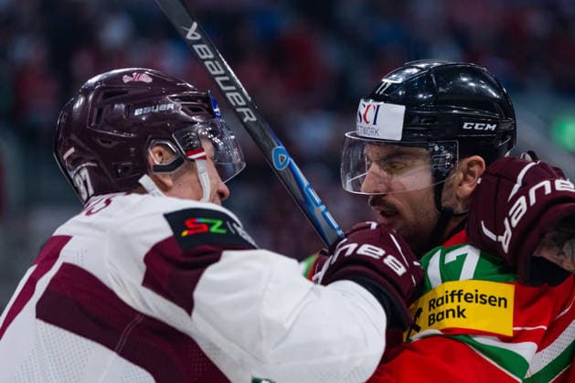 ZURICH, SWITZERLAND - MAY 26: Oskars Lapinskis (Latvia, 37) and Roland Kiss (Hungary, 17) discussing during the Preliminary Round - Group A Match 51 between Hungary and Latvia at the IIHF Ice hockey, Eishockey World Championship, WM, Weltmeisterschaft 2026, Swiss Life Arena on May 26, 2026 in Zurich, Switzerland. Zurich Switzerland Copyright: xTimoxSteinx