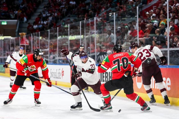 Ice hockey, Eishockey - IIHF WC 2026 ZURICH,SWITZERLAND,26.MAY.26 - ICE HOCKEY - IIHF Ice Hockey World Championship, WM, Weltmeisterschaft 2026, group stage, Hungary vs Latvia. Image shows Deniss Smirnovs (LAT) and Zsombor Garat (HUN).  GEPAxpictures xMaticxKlansek
