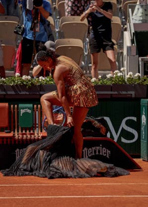 Naomi Osaka of Japan wears a gold sequinned dress under a black sequinned long skirt and corset French Open Tennis, Day Three, Tennis, Roland Garros, Paris, France - 26 May 2026Paris Roland Garros France EDITORIAL USE ONLY No use with unauthorised audio, video, data, fixture lists, club league logos or live services. Online in-match use limited to 120 images, no video emulation. No use in betting, games or single club league player publications.  Copyright: xEllaxLing Shutterstockx 16898259o