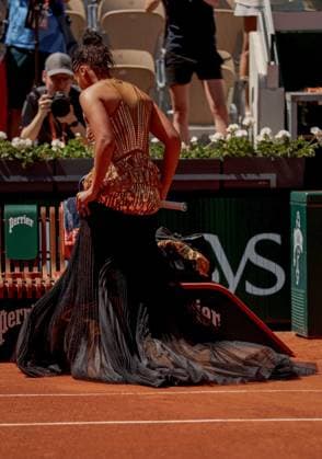 Naomi Osaka of Japan wears a gold sequinned dress under a black sequinned long skirt and corset French Open Tennis, Day Three, Tennis, Roland Garros, Paris, France - 26 May 2026Paris Roland Garros France EDITORIAL USE ONLY No use with unauthorised audio, video, data, fixture lists, club league logos or live services. Online in-match use limited to 120 images, no video emulation. No use in betting, games or single club league player publications.  Copyright: xEllaxLing Shutterstockx 16898259q