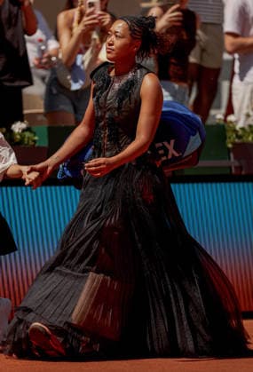Naomi Osaka of Japan wears a gold sequinned dress under a black sequinned long skirt and corset French Open Tennis, Day Three, Tennis, Roland Garros, Paris, France - 26 May 2026Paris Roland Garros France EDITORIAL USE ONLY No use with unauthorised audio, video, data, fixture lists, club league logos or live services. Online in-match use limited to 120 images, no video emulation. No use in betting, games or single club league player publications.  Copyright: xEllaxLing Shutterstockx 16898259g