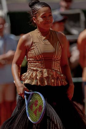 Naomi Osaka of Japan wears a gold sequinned dress under a black sequinned long skirt and corset French Open Tennis, Day Three, Tennis, Roland Garros, Paris, France - 26 May 2026Paris Roland Garros France EDITORIAL USE ONLY No use with unauthorised audio, video, data, fixture lists, club league logos or live services. Online in-match use limited to 120 images, no video emulation. No use in betting, games or single club league player publications.  Copyright: xEllaxLing Shutterstockx 16898259a