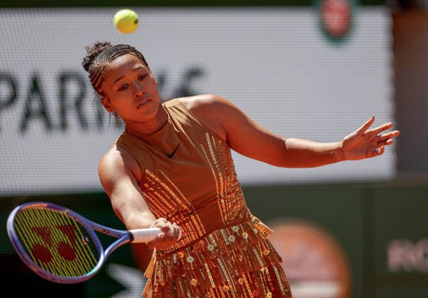 Naomi Osaka of Japan wears a gold sequinned dress under a black sequinned long skirt and corset French Open Tennis, Day Three, Tennis, Roland Garros, Paris, France - 26 May 2026Paris Roland Garros France EDITORIAL USE ONLY No use with unauthorised audio, video, data, fixture lists, club league logos or live services. Online in-match use limited to 120 images, no video emulation. No use in betting, games or single club league player publications.  Copyright: xEllaxLing Shutterstockx 16898259af