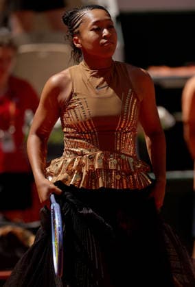 Naomi Osaka of Japan wears a gold sequinned dress under a black sequinned long skirt and corset French Open Tennis, Day Three, Tennis, Roland Garros, Paris, France - 26 May 2026Paris Roland Garros France EDITORIAL USE ONLY No use with unauthorised audio, video, data, fixture lists, club league logos or live services. Online in-match use limited to 120 images, no video emulation. No use in betting, games or single club league player publications.  Copyright: xEllaxLing Shutterstockx 16898259b
