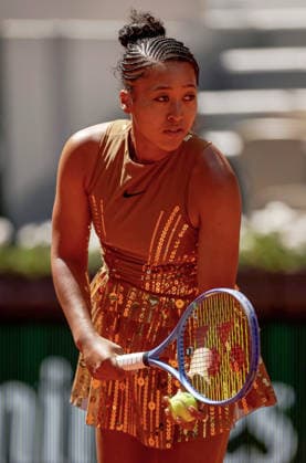 Naomi Osaka of Japan wears a gold sequinned dress under a black sequinned long skirt and corset French Open Tennis, Day Three, Tennis, Roland Garros, Paris, France - 26 May 2026Paris Roland Garros France EDITORIAL USE ONLY No use with unauthorised audio, video, data, fixture lists, club league logos or live services. Online in-match use limited to 120 images, no video emulation. No use in betting, games or single club league player publications.  Copyright: xEllaxLing Shutterstockx 16898259aa