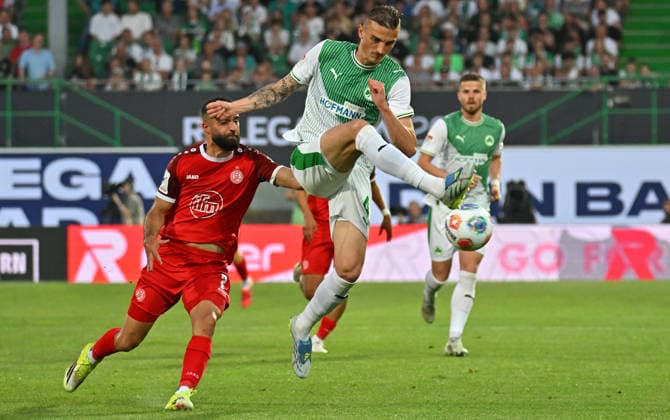 26 05 2026 Soccer season 2025 2026 Relegation 2 Soccer Bundesliga second leg SpVgg Greuther Fürth Kleeblatt Rot Weiss Essen RWE Sportfoto Zink MeZi xmexzix DFL regulations prohibit any use of photographs as image sequences and or quasi video only for editorial use Ramien Safi 7, Rot Weiss Essen Philipp Ziereis 4, SpVgg Greuther Fürth, right